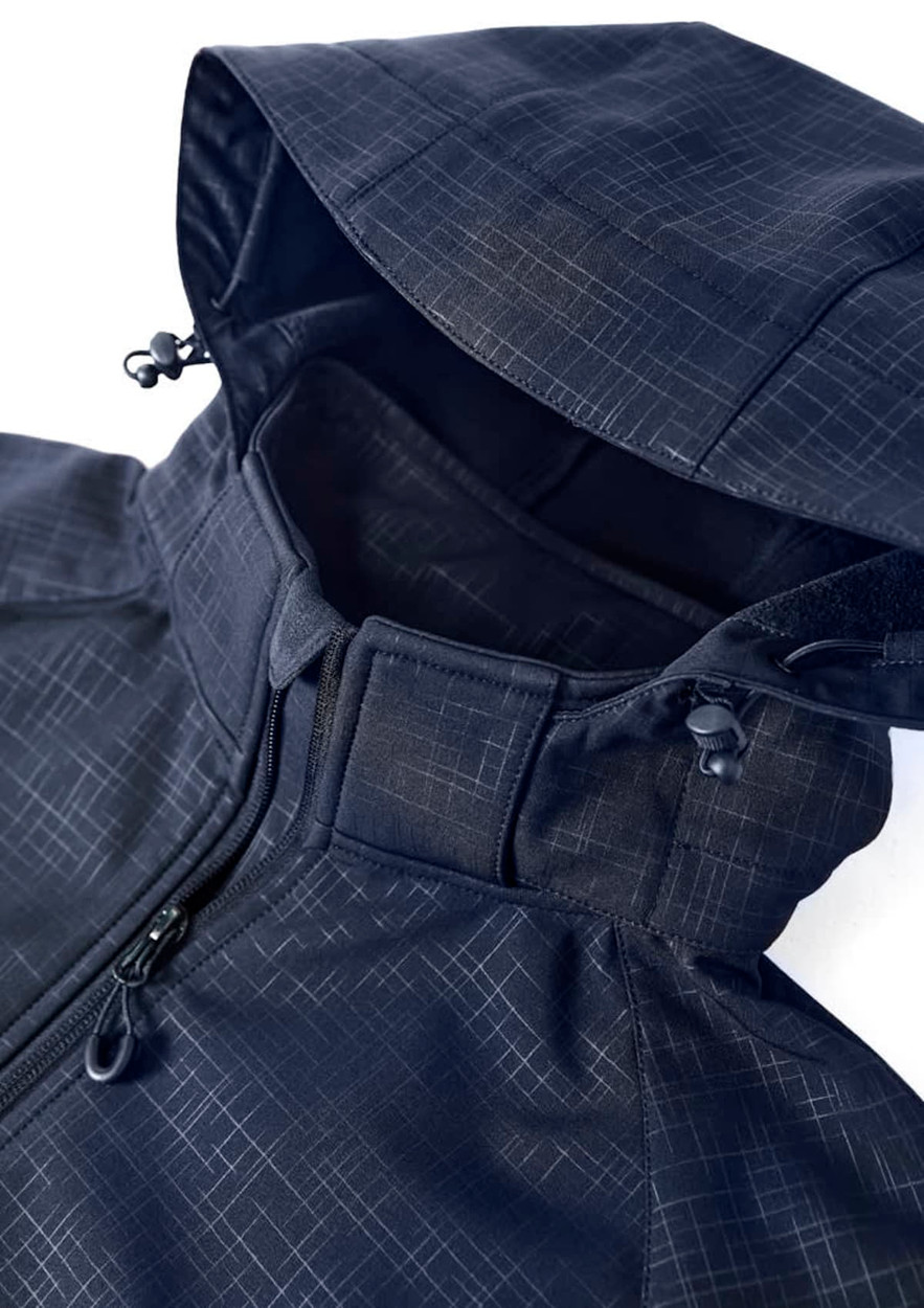 A women's soft shell jacket in navy blue with a geometric pattern and a hood, featuring a logo.