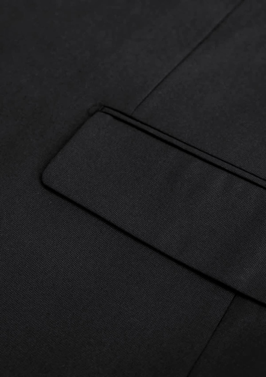 A black jacket featuring a sleek design with a subtle pocket detail and smooth fabric finish.