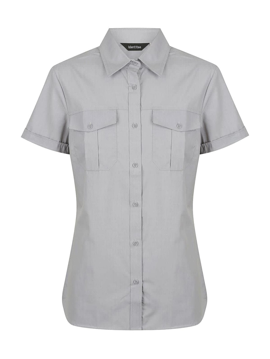 A ladies' short sleeve button-up shirt in light grey, featuring two buttoned chest pockets and a collar.