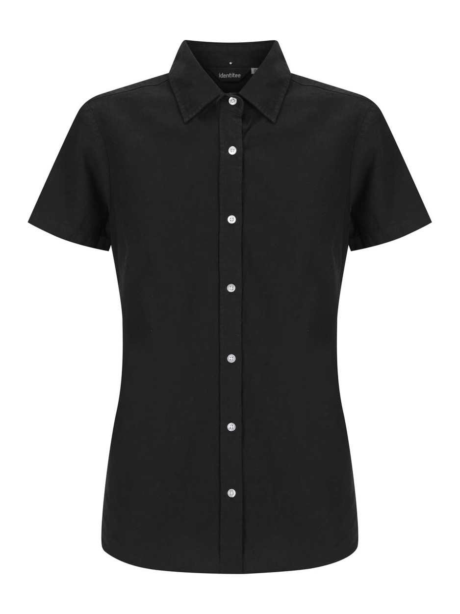 A black ladies' short sleeve shirt with a fitted design and button placket, featuring a logo on the label.
