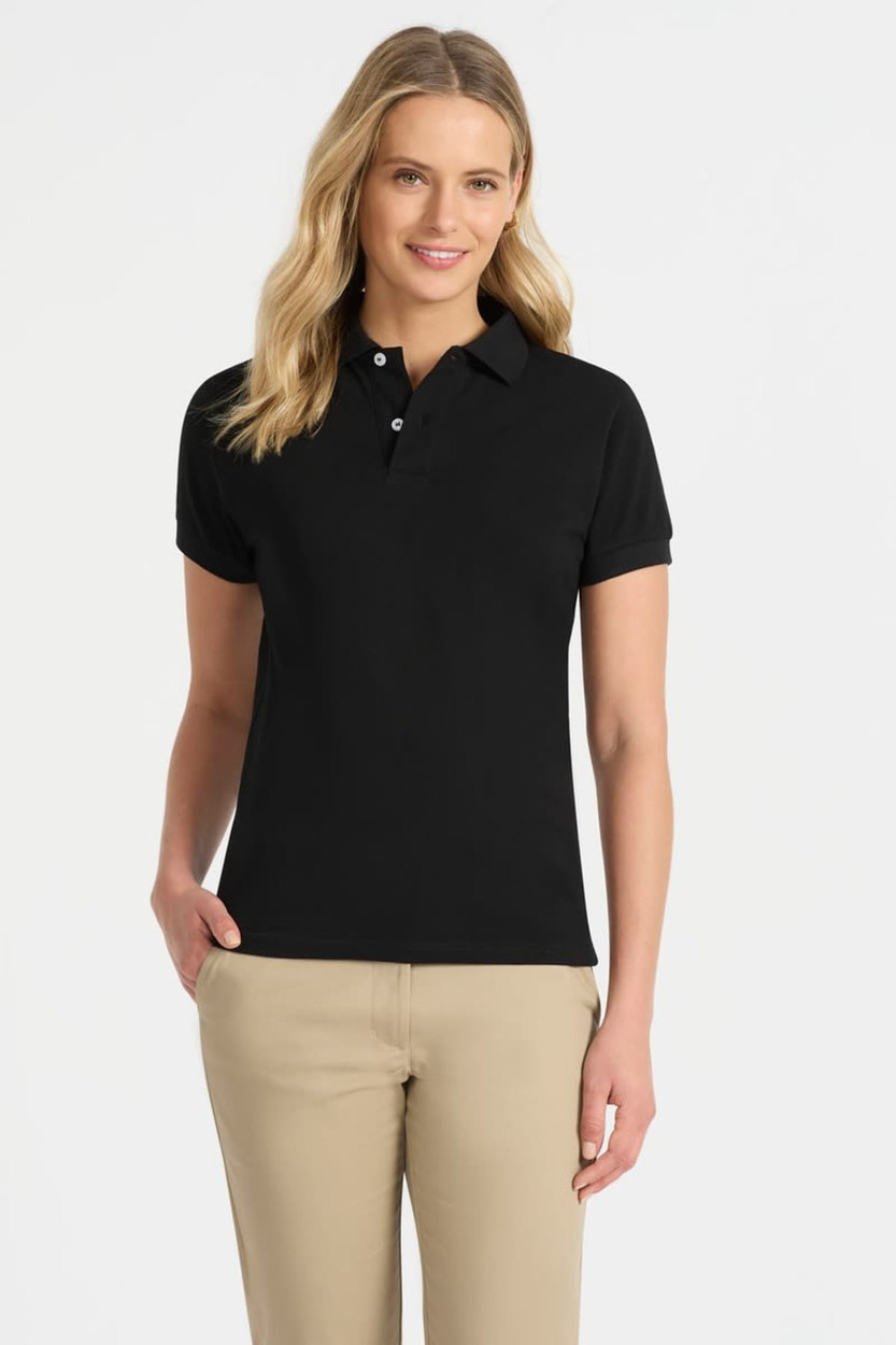 A black ladies' polo shirt featuring a classic collar and a logo. The model is wearing it with beige pants.