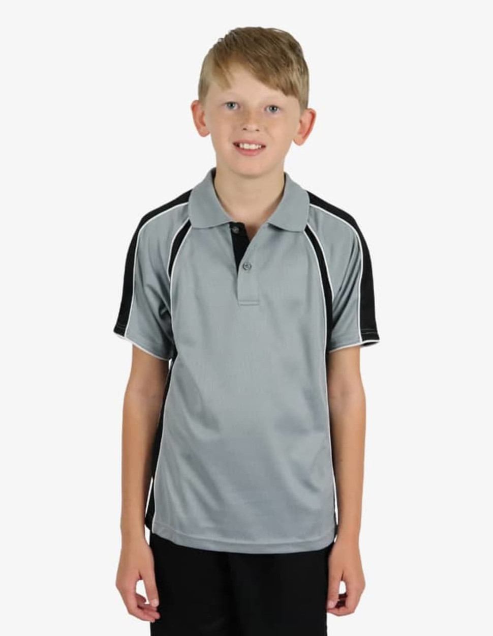 A youth wearing a grey polo shirt with black accents, featuring a logo on the chest area.
