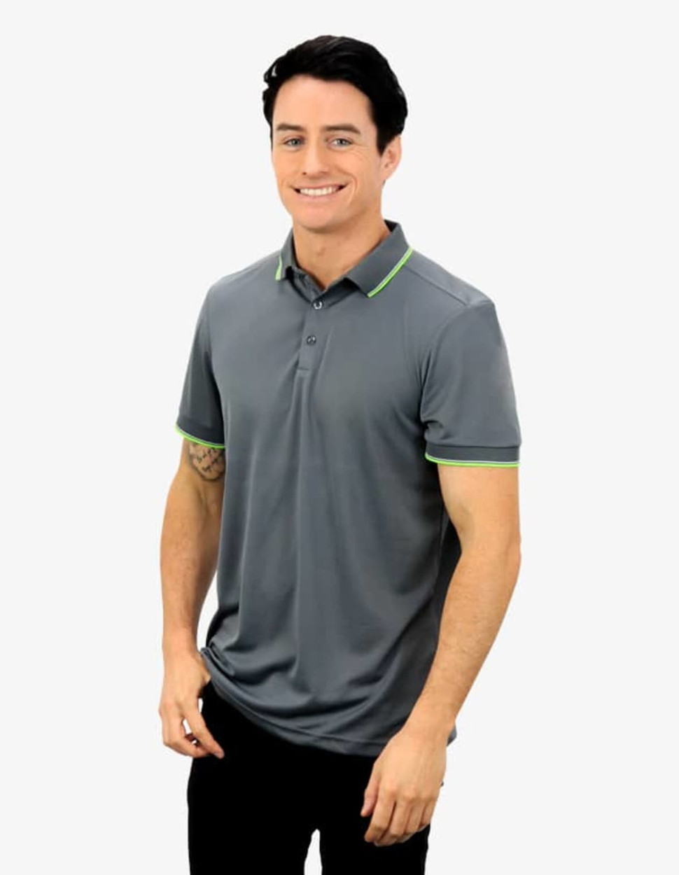 A grey polo shirt with green detailing, featuring a collar and a logo. The fit is casual and modern.