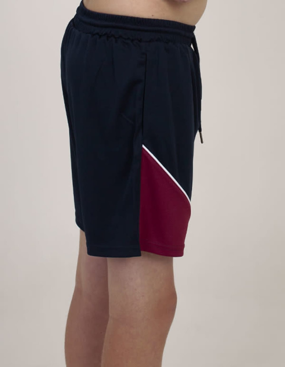 Sports shorts in navy with a maroon and white side panel; elastic waistband with a drawstring.