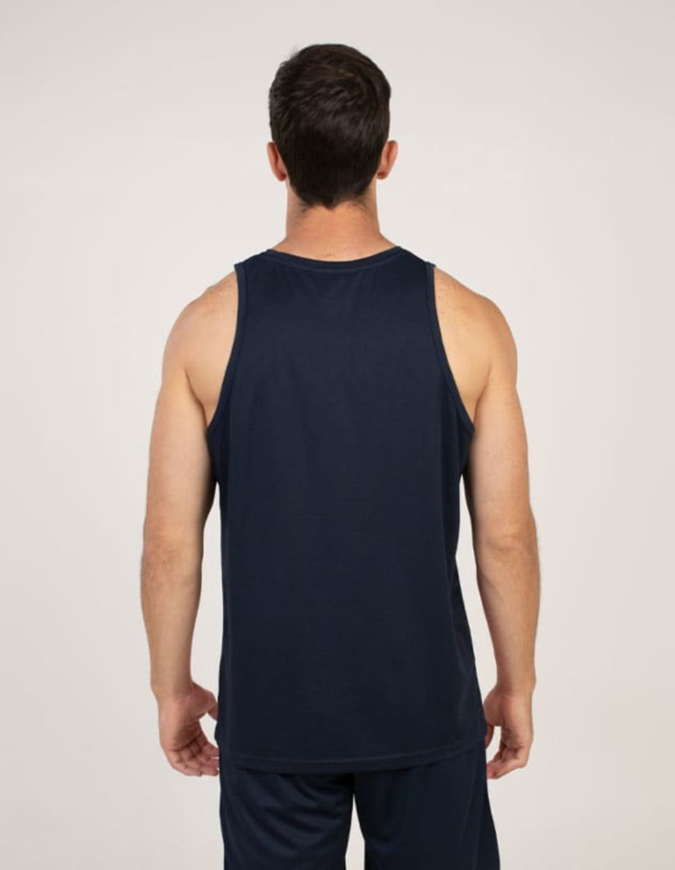 A sleeveless navy blue singlet displayed from the back, featuring a simple design and no visible logos.