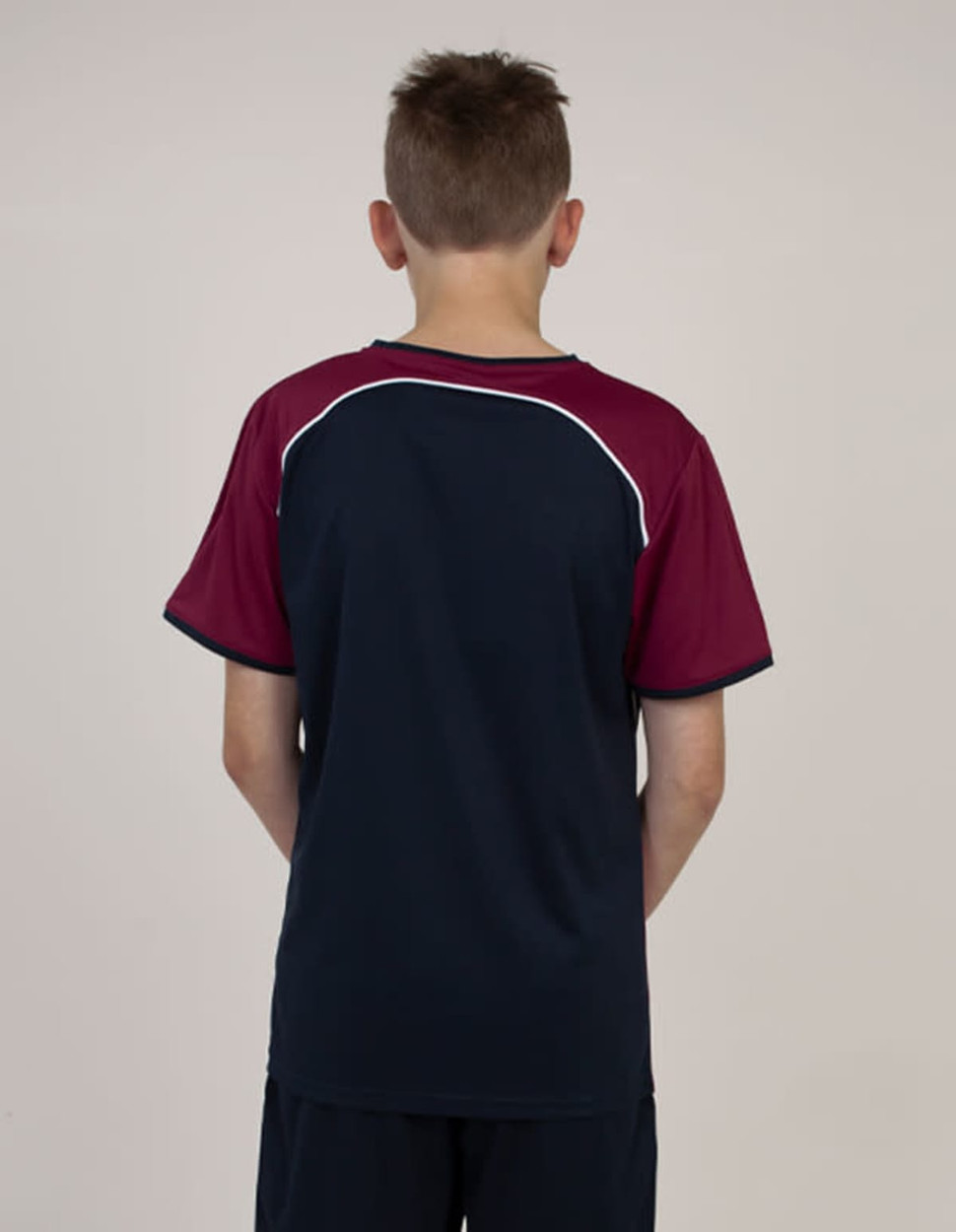 A T-shirt in navy and maroon with contrasting white piping, featuring a logo on the back.
