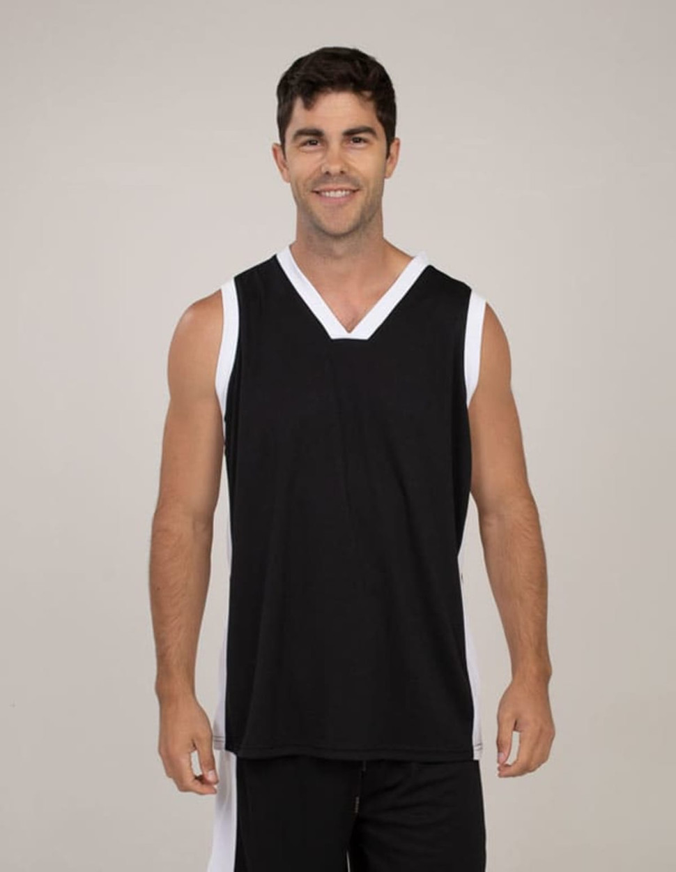 A black singlet with white accents, featuring a V-neck design and a logo. Worn by a smiling model.