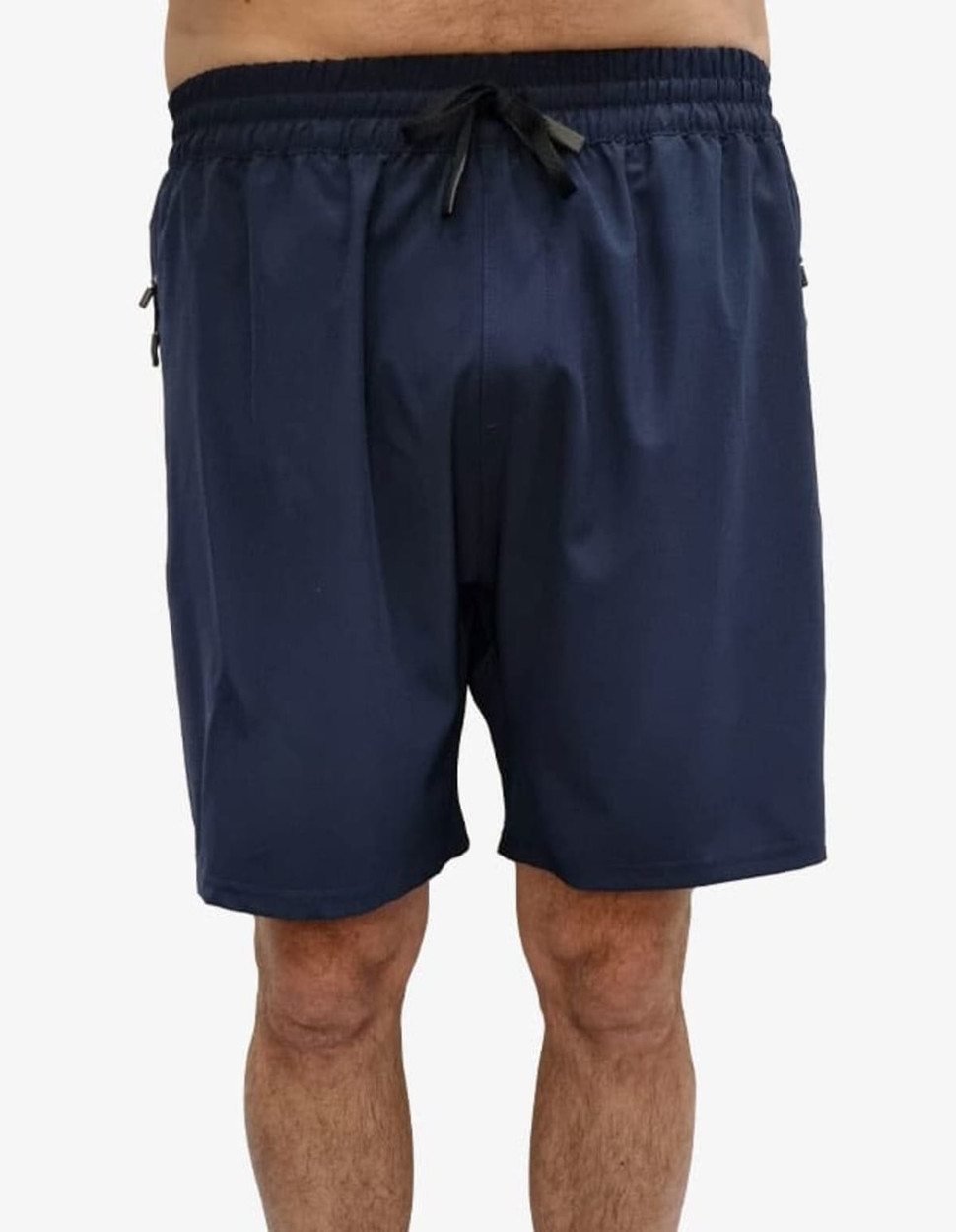 Navy sports shorts featuring an elastic waistband and side pockets. The design includes a logo.