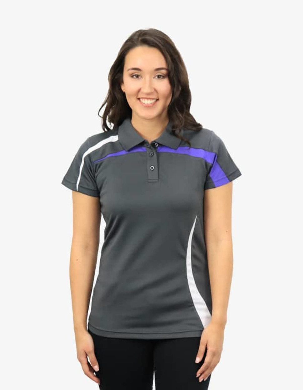A woman wearing a grey polo shirt with purple and white accents. The shirt features a branded logo.