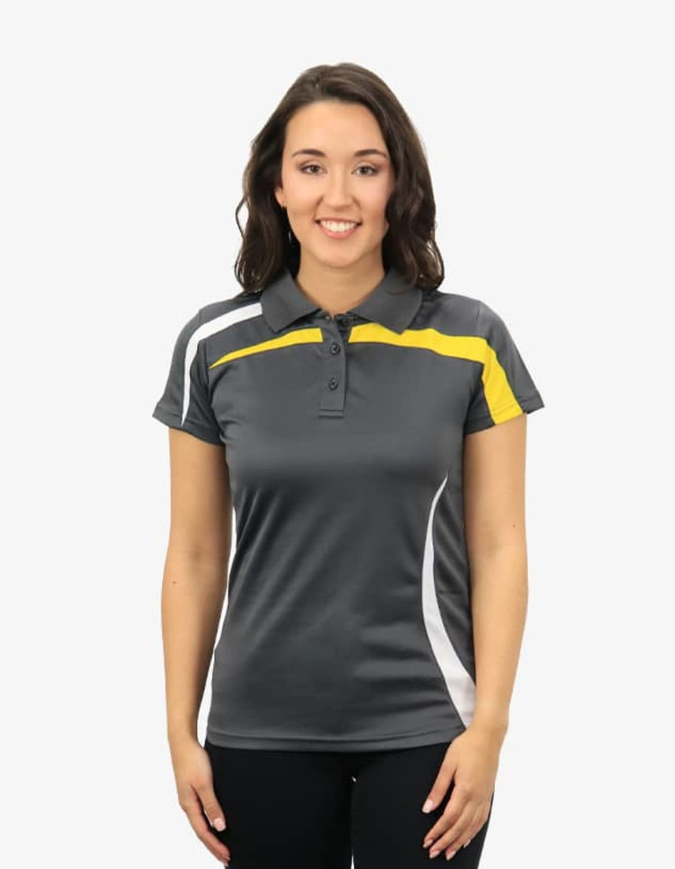 A grey and yellow polo shirt on a smiling woman, featuring a sporty design and a logo on the chest.