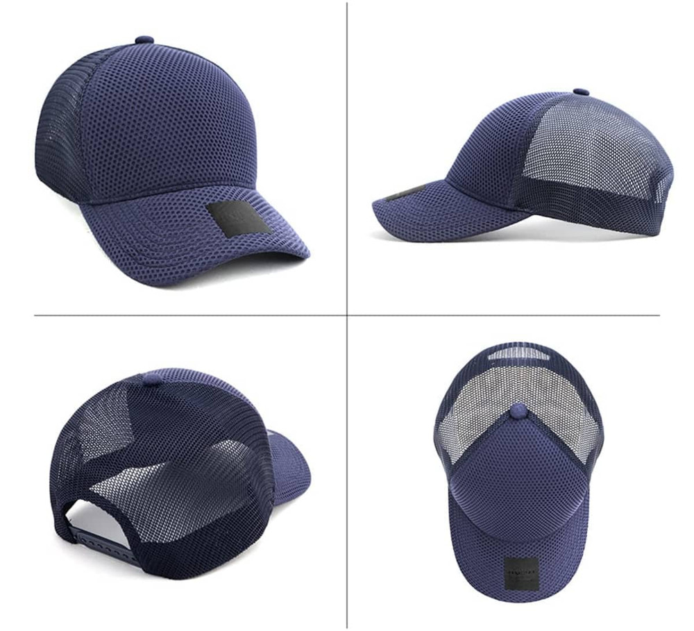 A navy nylon and mesh cap featuring a logo, with panels for breathability and an adjustable strap.