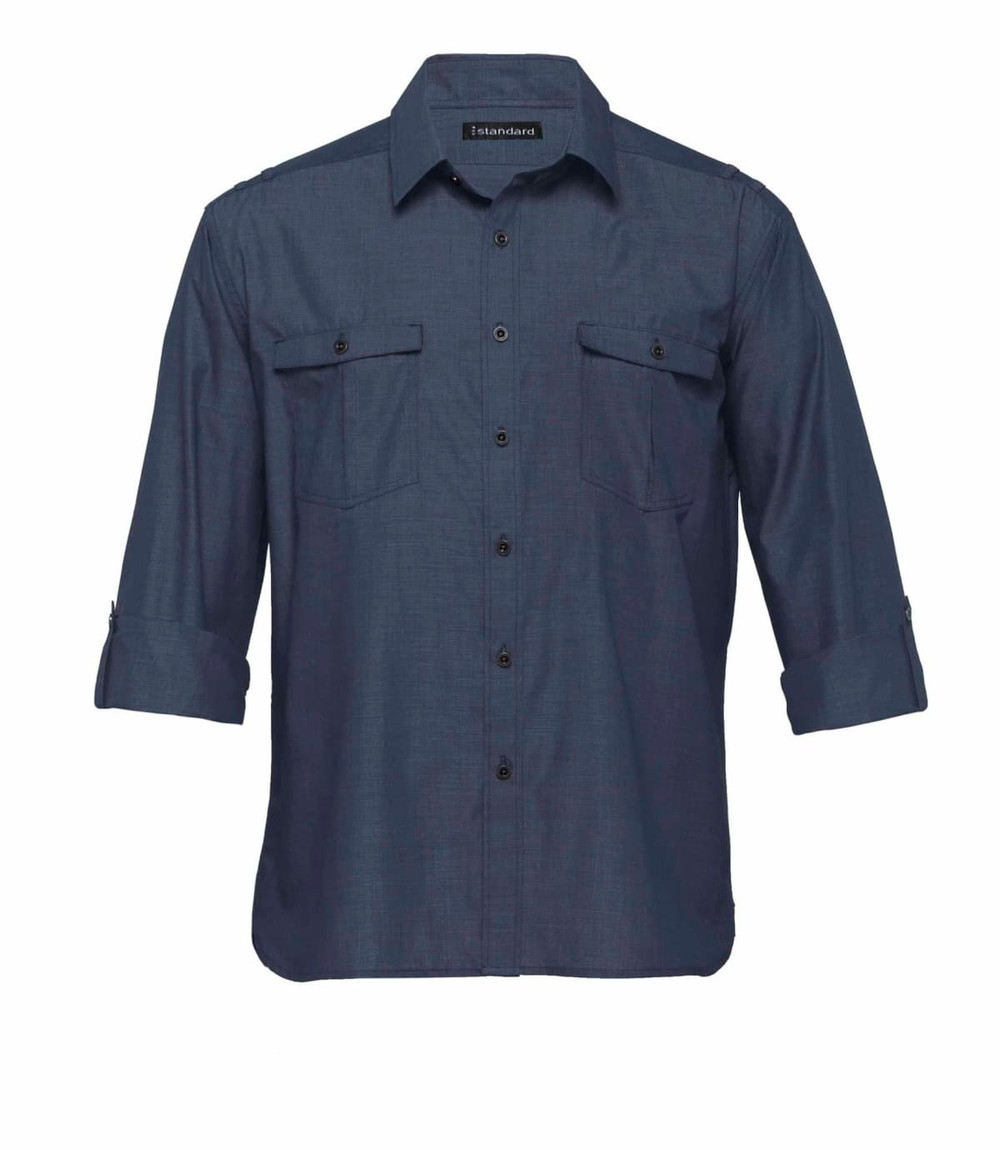 A men's button-up shirt in dark navy with two chest pockets and rolled-up sleeves. Features branding on the collar.