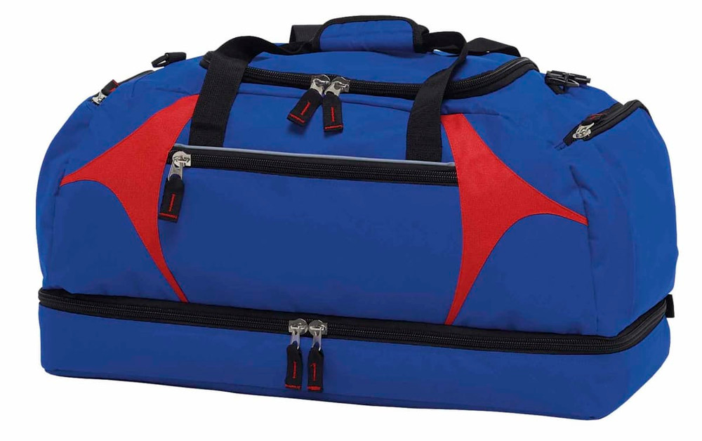 A blue and red duffle bag featuring multiple zippered compartments and a sturdy handle. It has a logo.