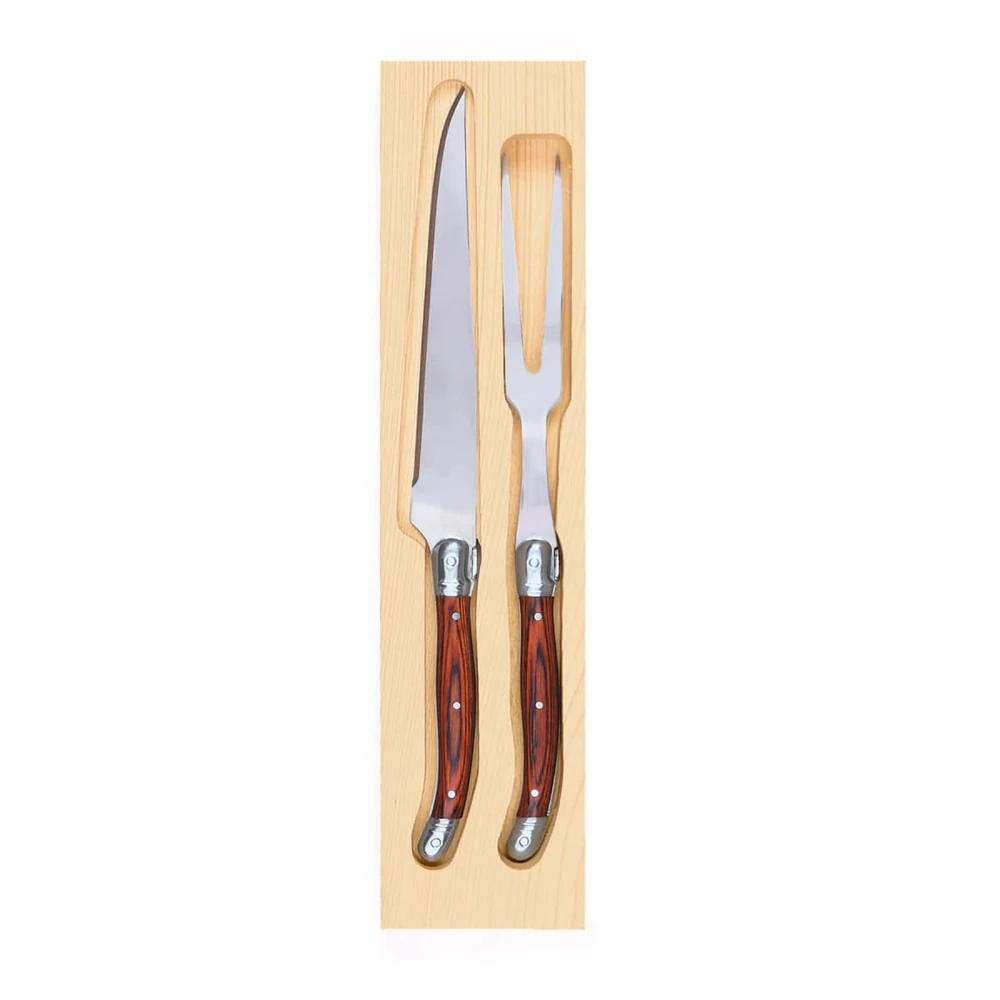 A Bordeaux carving set featuring a knife and fork with wooden handles, presented in a wooden box.