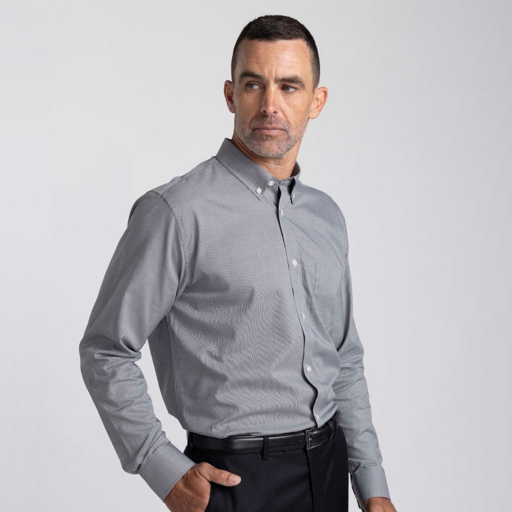 A men's button-up shirt in grey, featuring a button-down collar and a chest pocket, with a logo on the side.