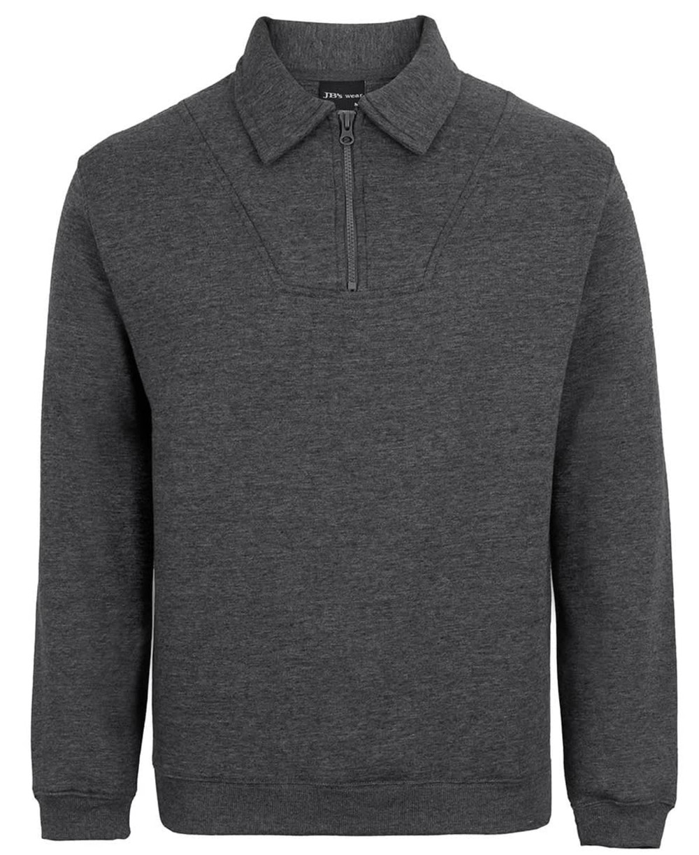 A dark grey polar fleece jumper featuring a half-zip collar and long sleeves. It has a logo on the front.
