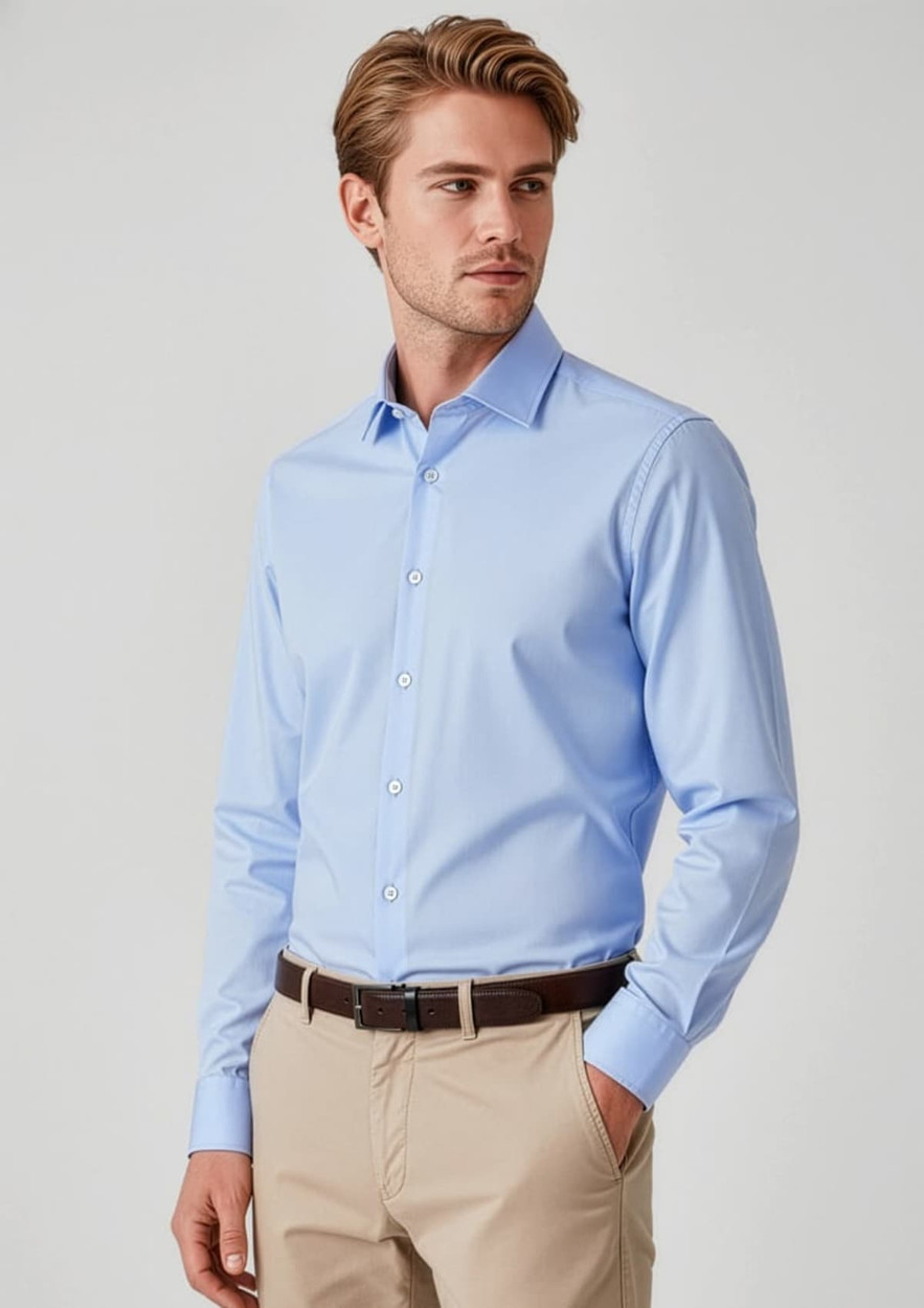 A slim fit long sleeve shirt in light blue, featuring a button-up design and a logo on the chest.
