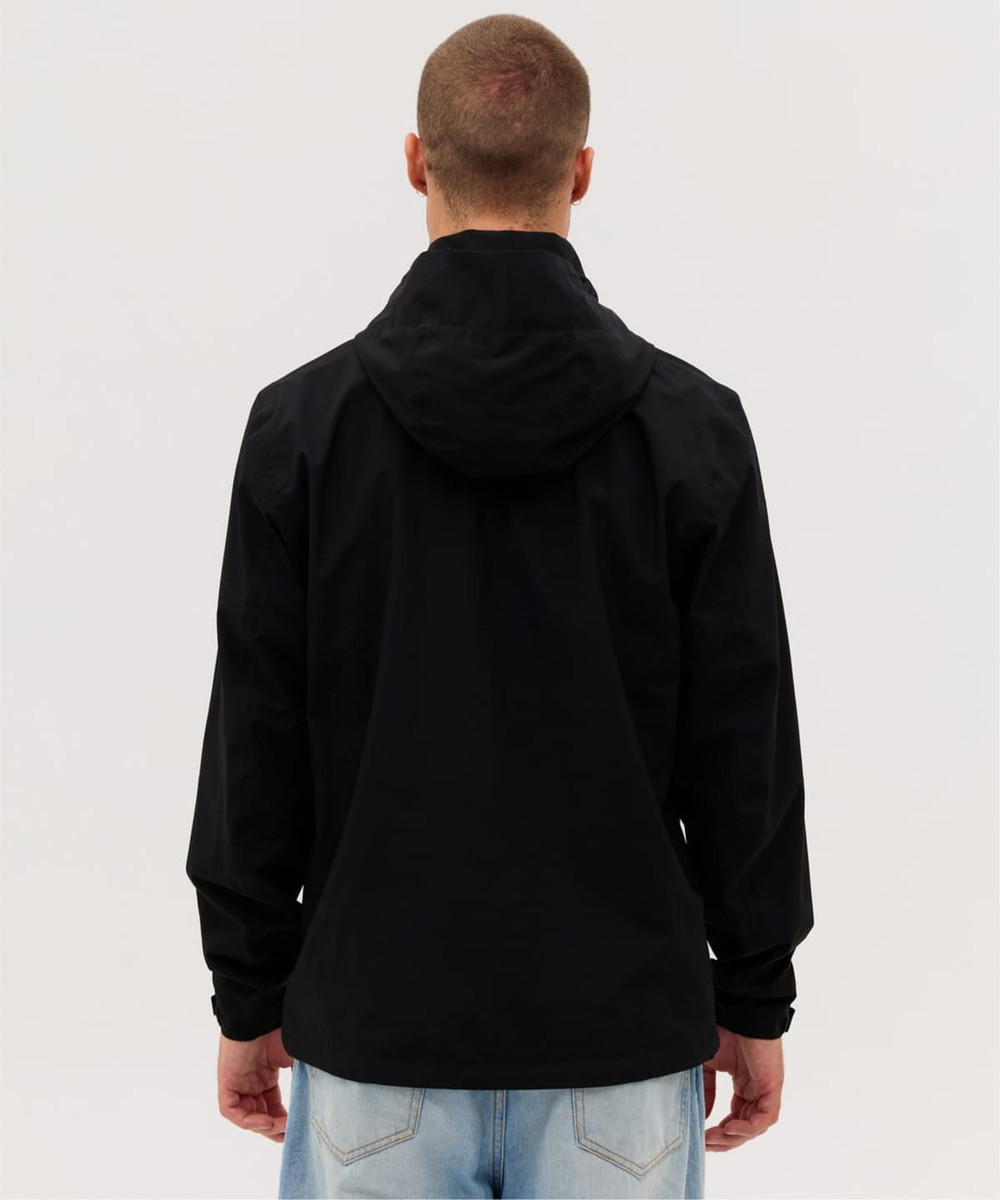 A black rain jacket with a hood, featuring a simple design and a logo on the back.