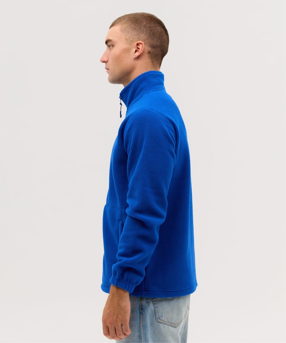A man wearing a blue Everest Polar Fleece Full Zip jacket, shown in profile against a plain background.