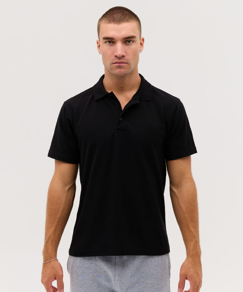 A black polo shirt with a collar and short sleeves, featuring a logo on the chest.