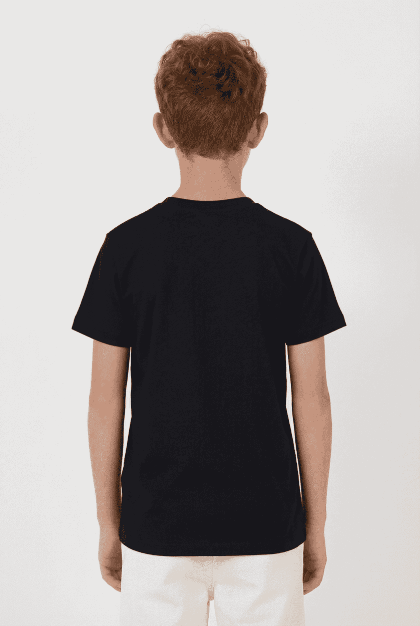 A black youth essential tee displayed on a child from the back, featuring a simple design and a logo.