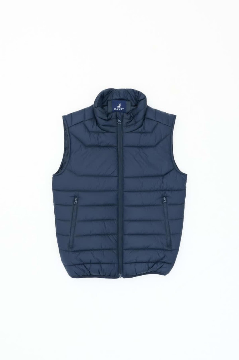 A navy puffer vest featuring a high collar and two side pockets, with branding on the inside.