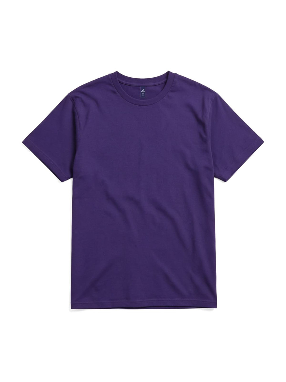 A purple essential tee shirt with short sleeves and a crew neckline, featuring a logo.