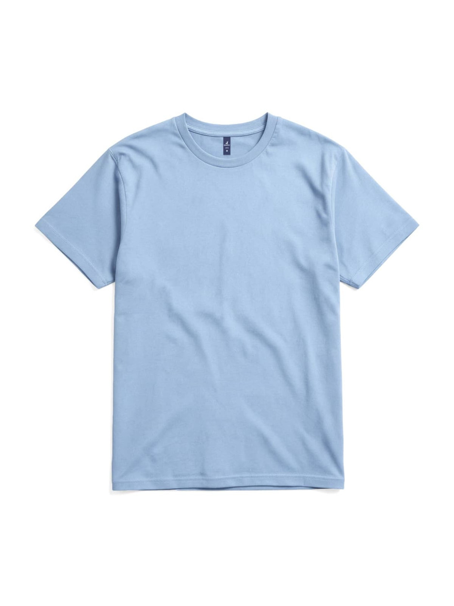 A light blue essential t-shirt displayed flat, featuring a simple design with a logo on the label.