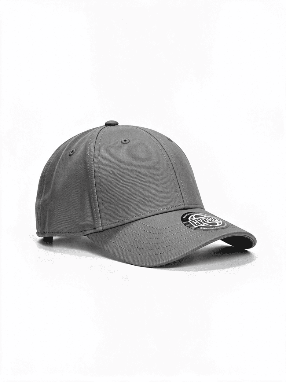 A grey cap featuring a rounded crown and a curved peak. It has a logo on the front.