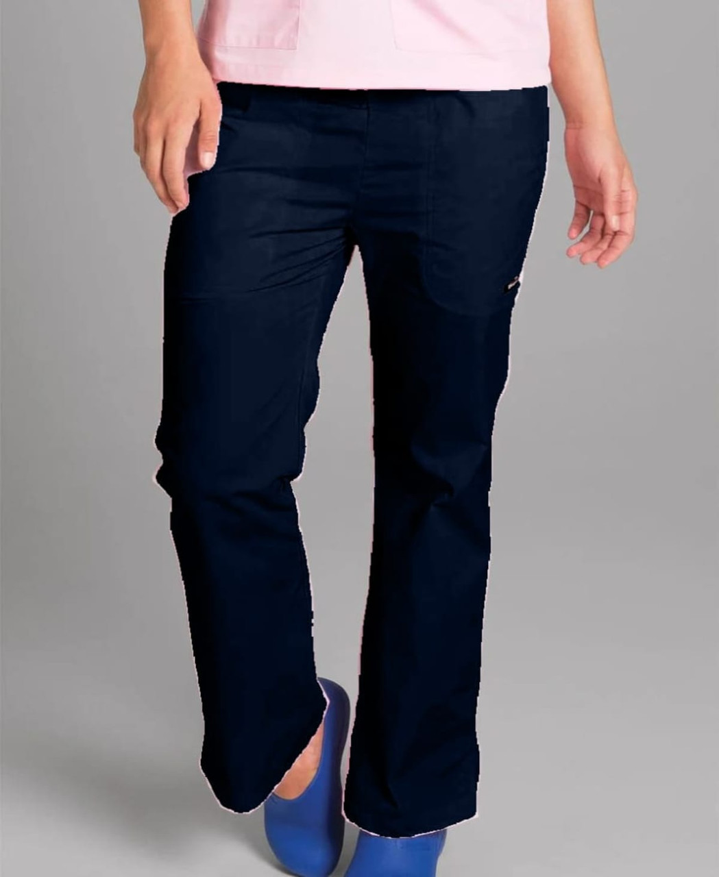 Navy scrubs pants for women featuring pockets and a logo. Worn with a pink top and blue shoes.