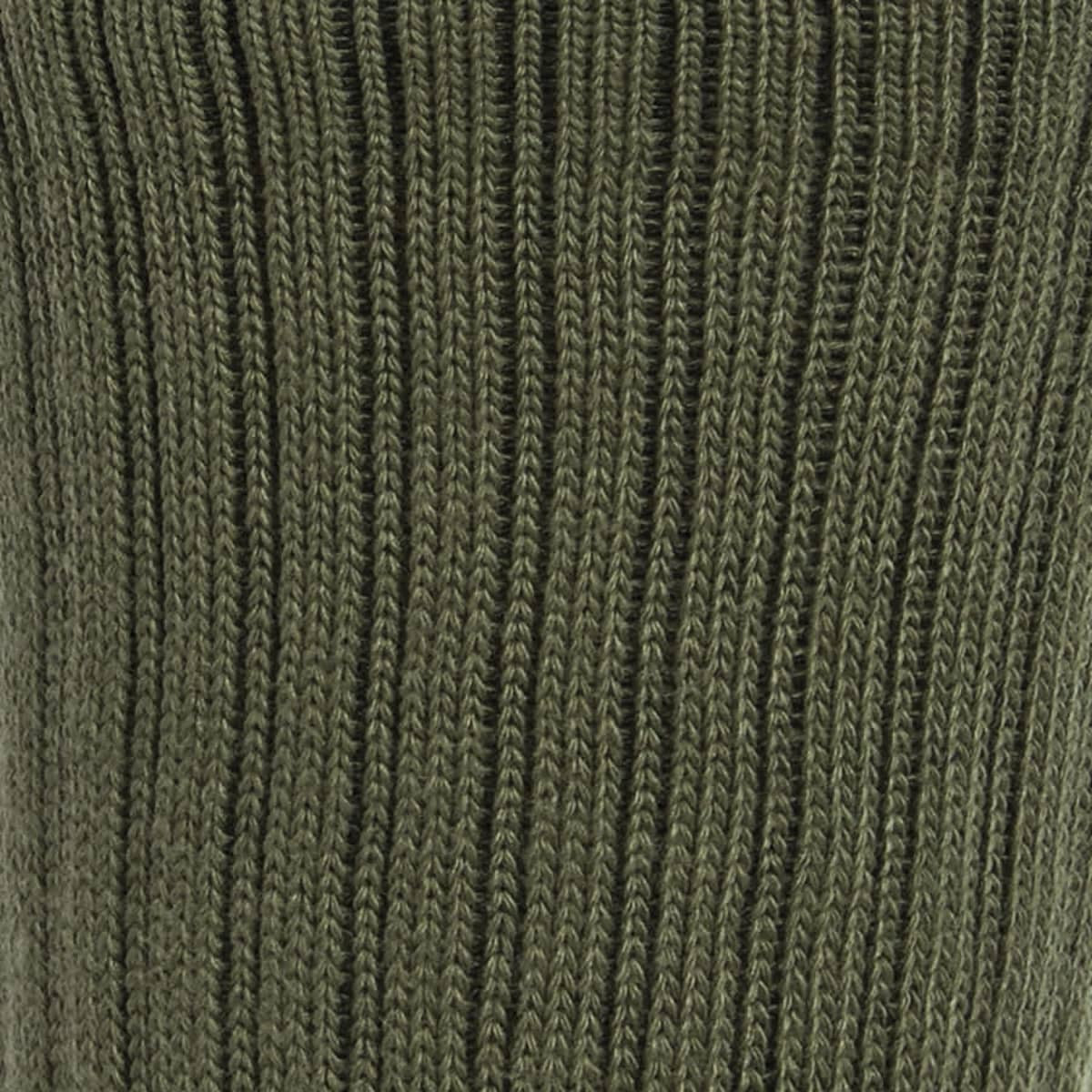 A close-up of a green knitted sock featuring a ribbed texture. The sock is part of a three-pack.