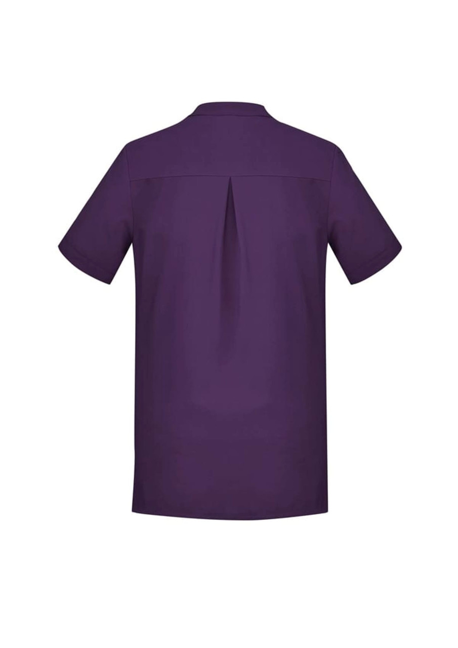 A purple women's tunic featuring short sleeves and a back pleat, with a logo on the back.