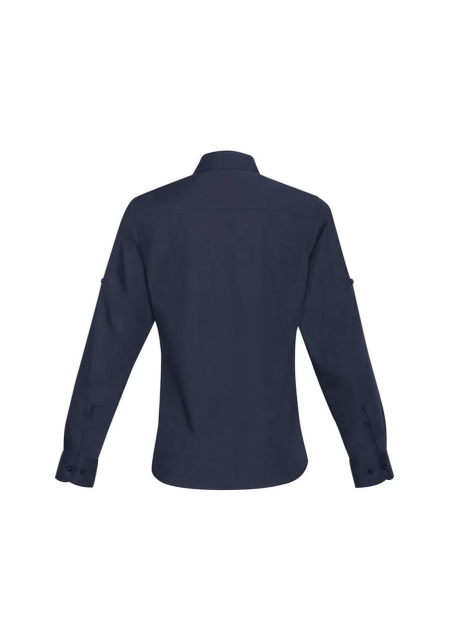 A women's long sleeve button-up shirt in navy blue, featuring a collar and buttoned cuffs. It has a logo on it.