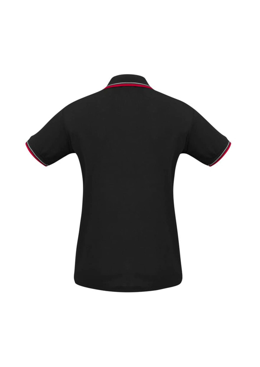 A black women's polo shirt with short sleeves and contrasting collar and sleeve detailing. Features a logo.