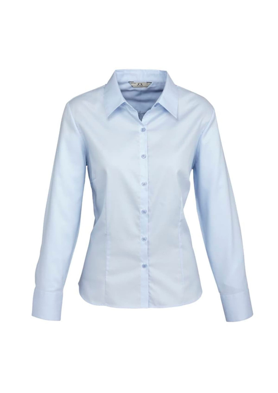 A light blue women's long sleeve button-up shirt with a collar and a logo on the label.
