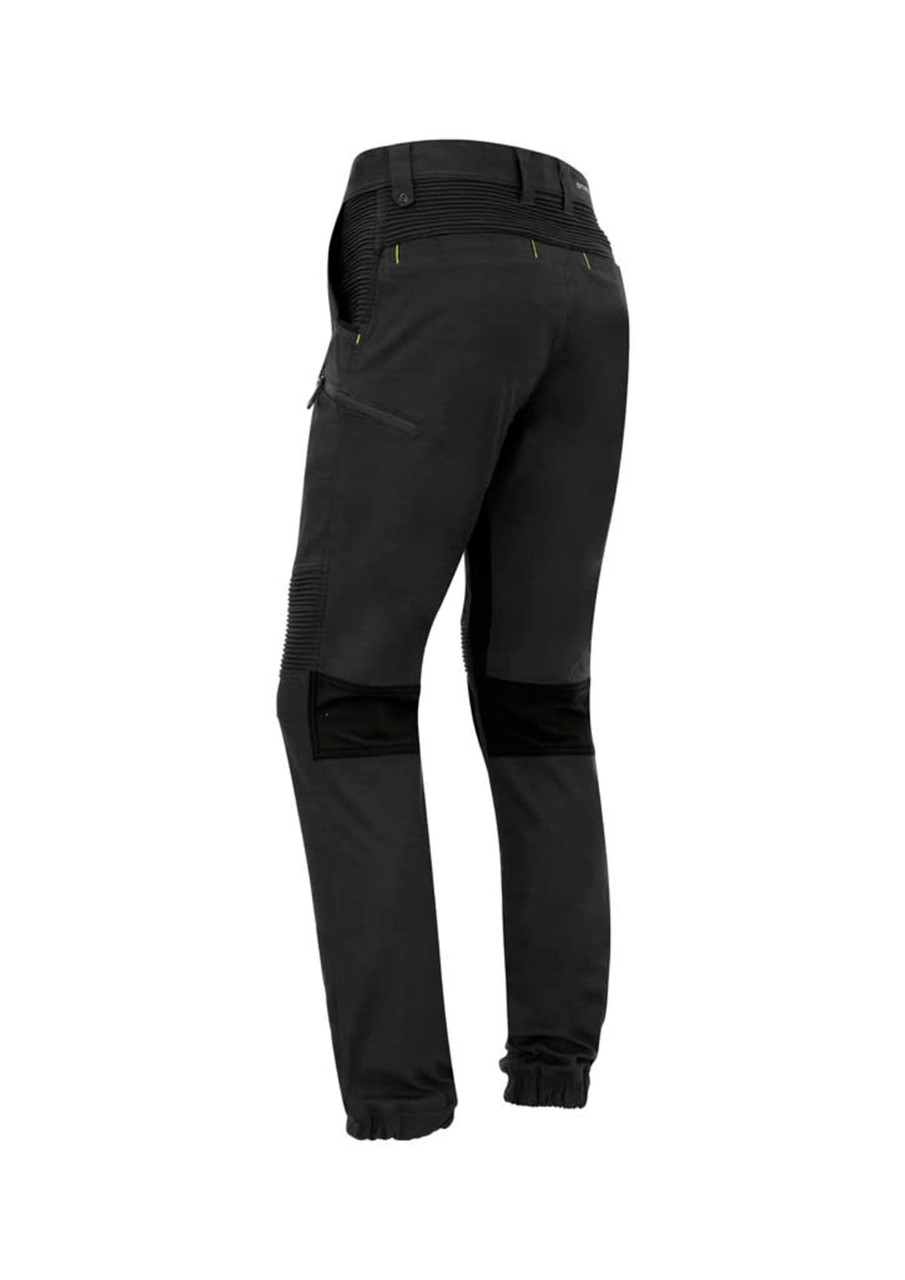 A pair of black cuffed stretch pants with yellow stitching and zip pockets, designed for workwear.