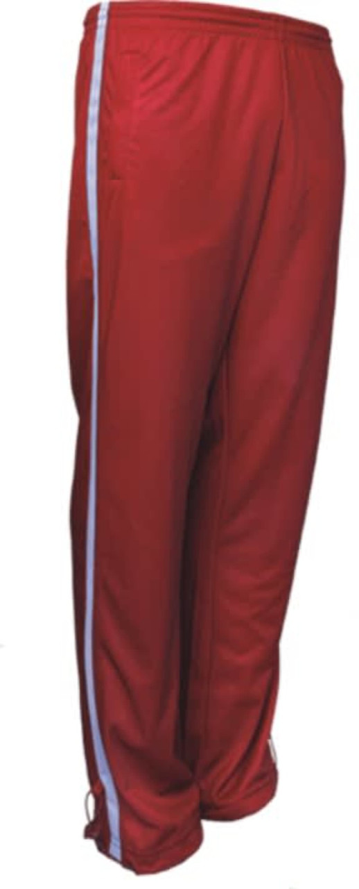 Red track pants featuring white side stripes, designed for kids, with an elastic waistband and branding.