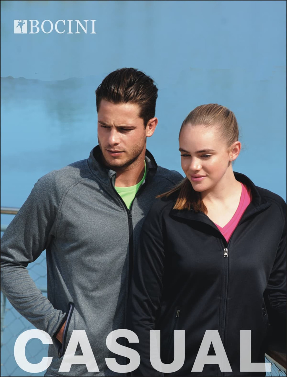 A lightweight fleece zip-through jacket in black, worn by a man and a woman, with a logo.