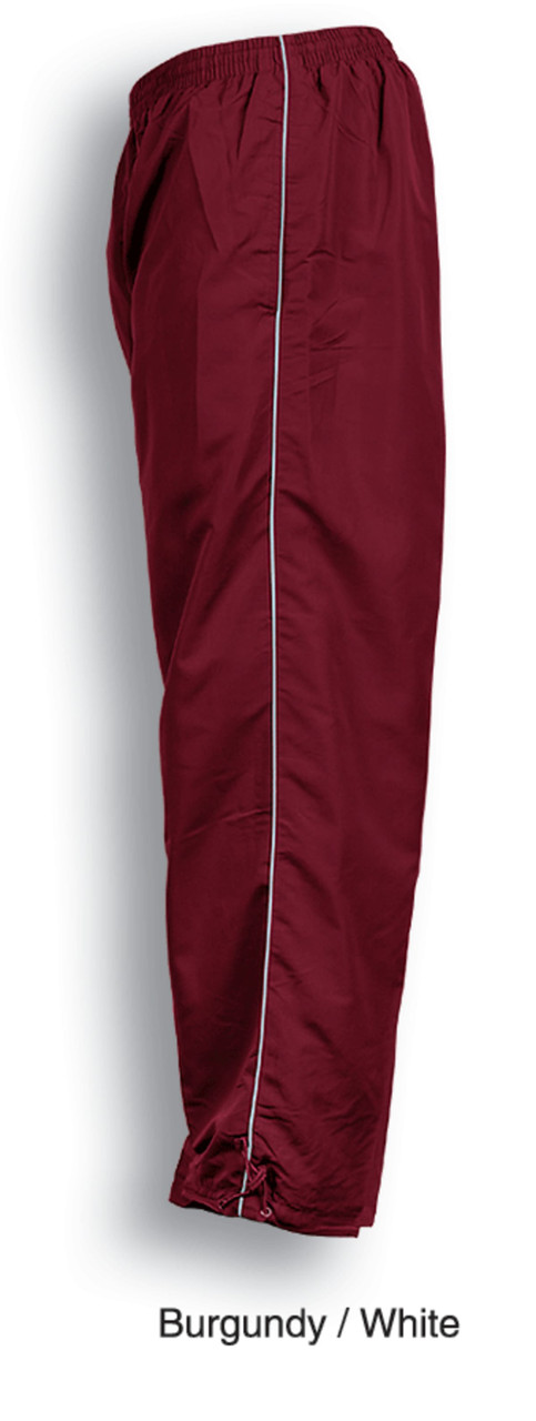 Burgundy track pants with white piping, featuring an elastic waistband and a zippered cuff. Includes a logo.