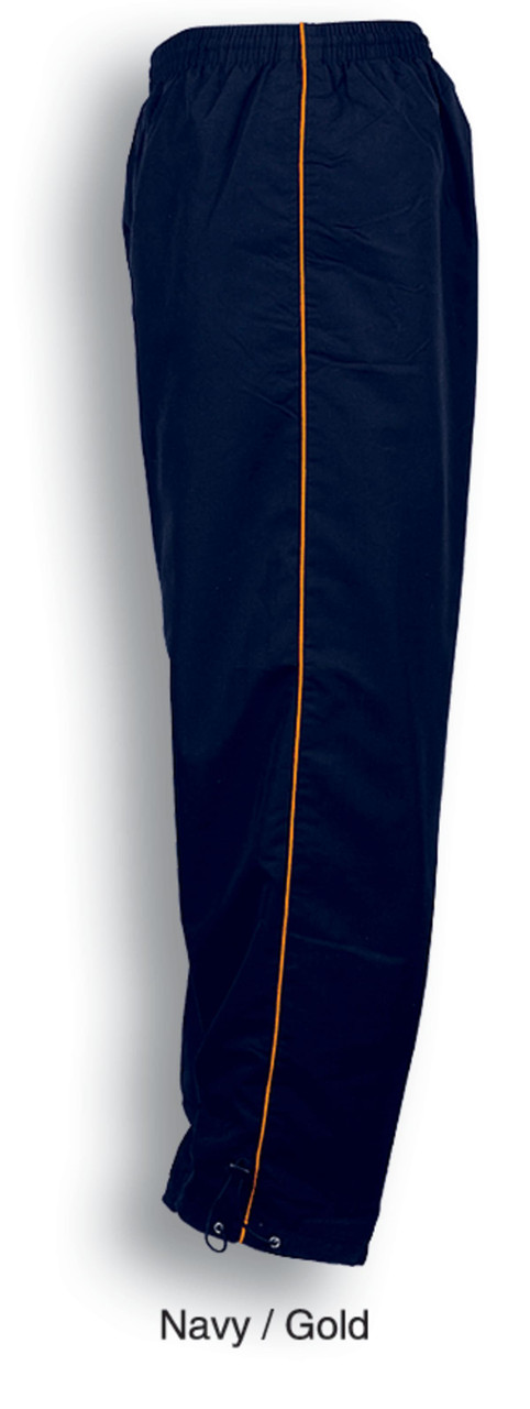 Navy track pants with gold piping and an elasticised waist. Features a logo on the side.