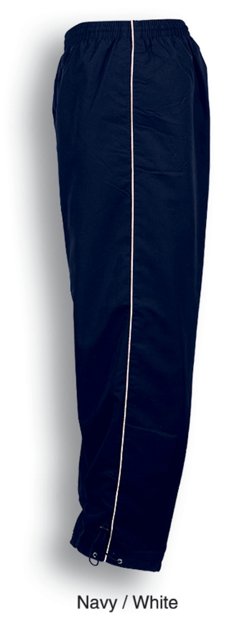 Navy track pants with white piping details, featuring an elastic waistband and cuffs. Includes branding.