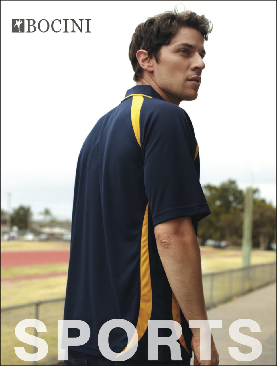 A navy and gold unisex polo shirt with a logo, featuring a contrast contour design.