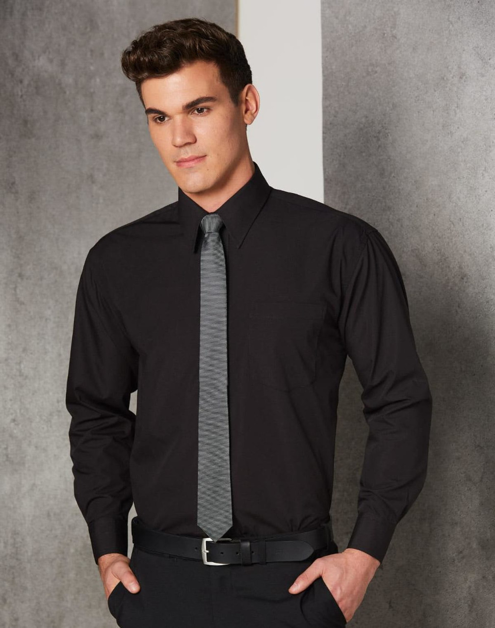 A black long sleeve business shirt with a collar, paired with a grey tie, and featuring a chest pocket.