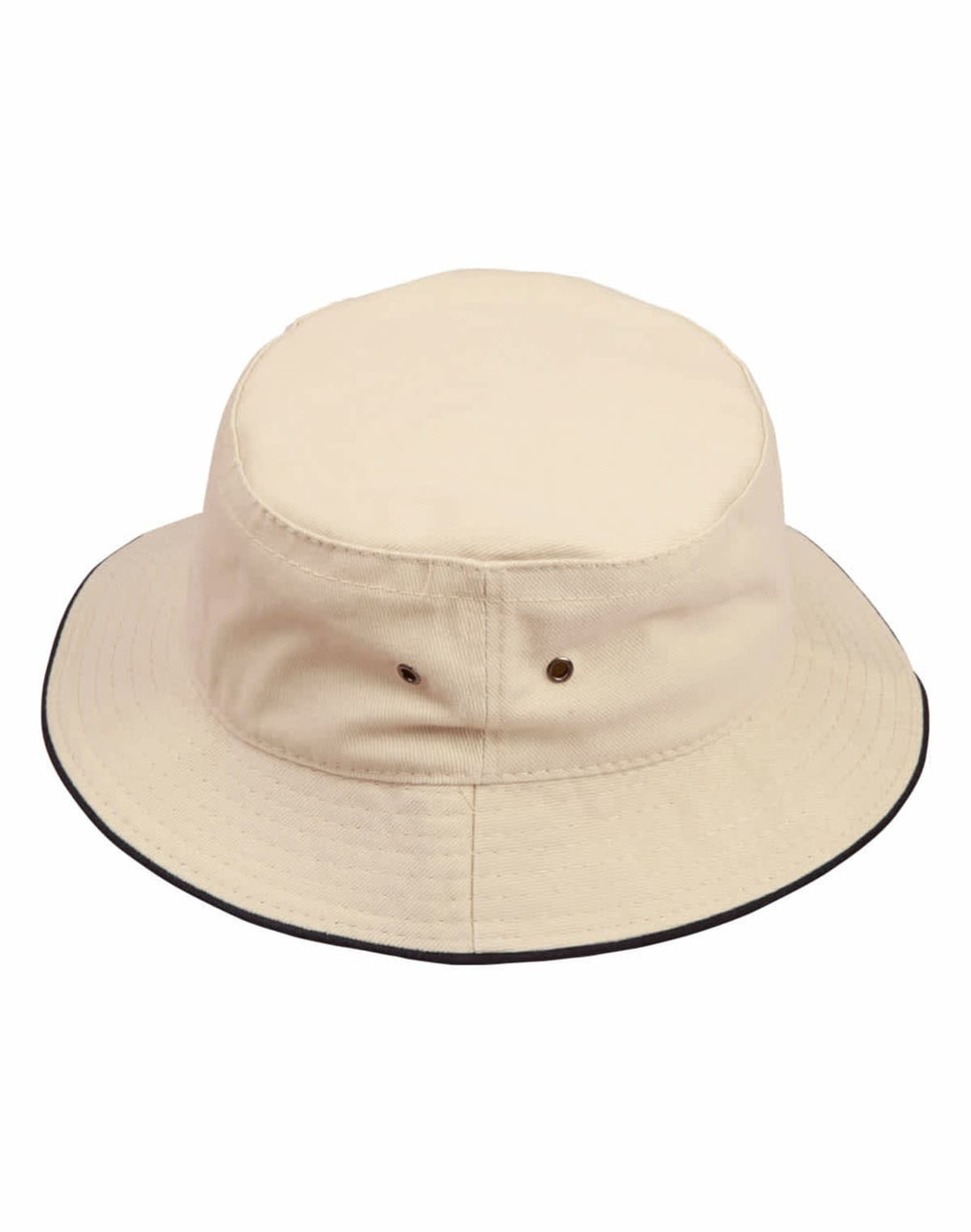 A soft washed bucket hat in cream with a contrasting black trim, featuring eyelets and a branded logo.