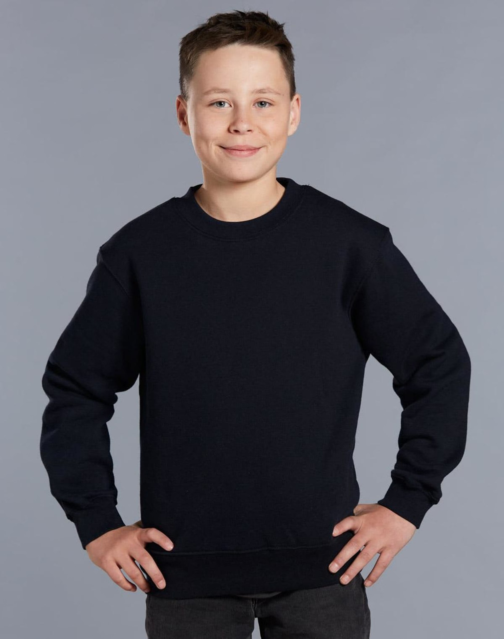 A dark navy kids' crew neck fleecy sweater, featuring a simple design and ribbed cuffs and hem.