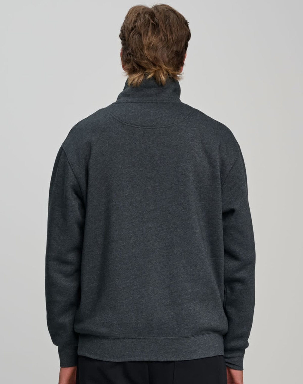 A grey 1/2 zip collar fleecy jumper with a relaxed fit, featuring a branded logo on the back.