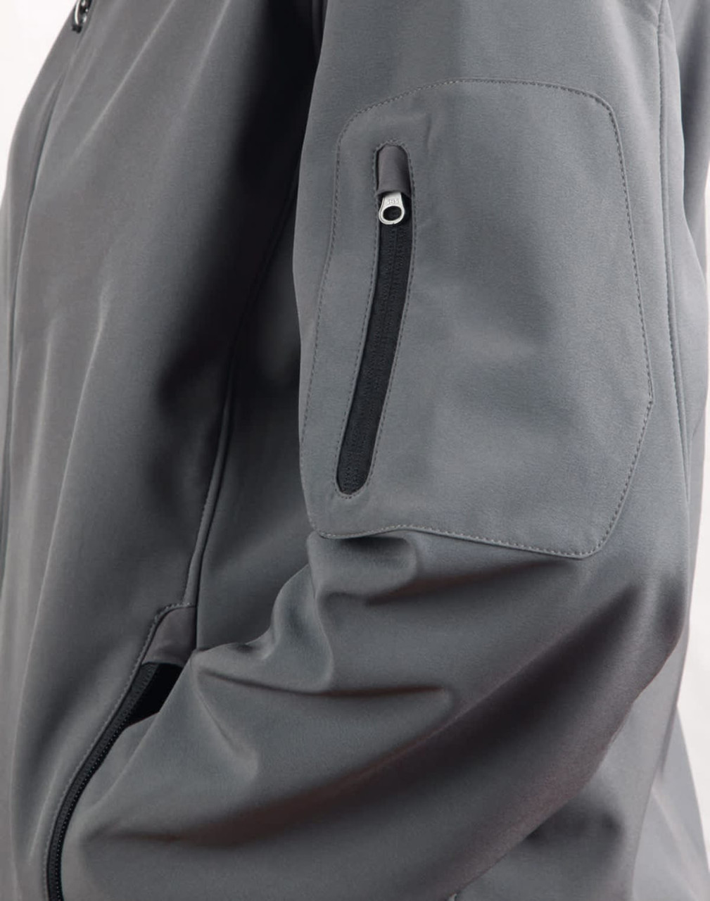 A grey Men's Softshell High-Tech Jacket featuring a zippered pocket on the sleeve and a sleek design.