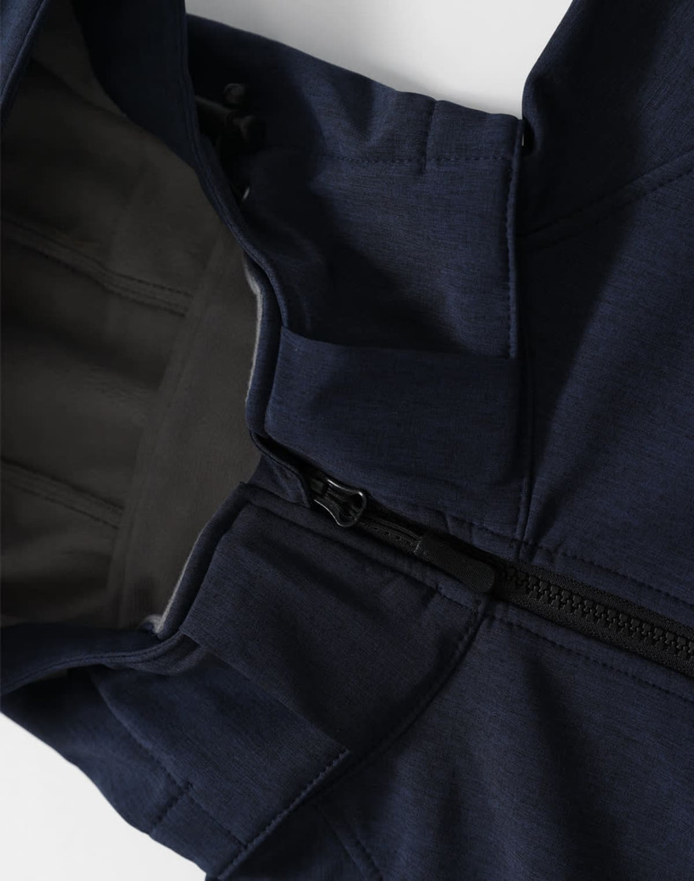 A navy men's softshell full zip hoodie with a grey lining and a zipper closure. Features a hood and logo.