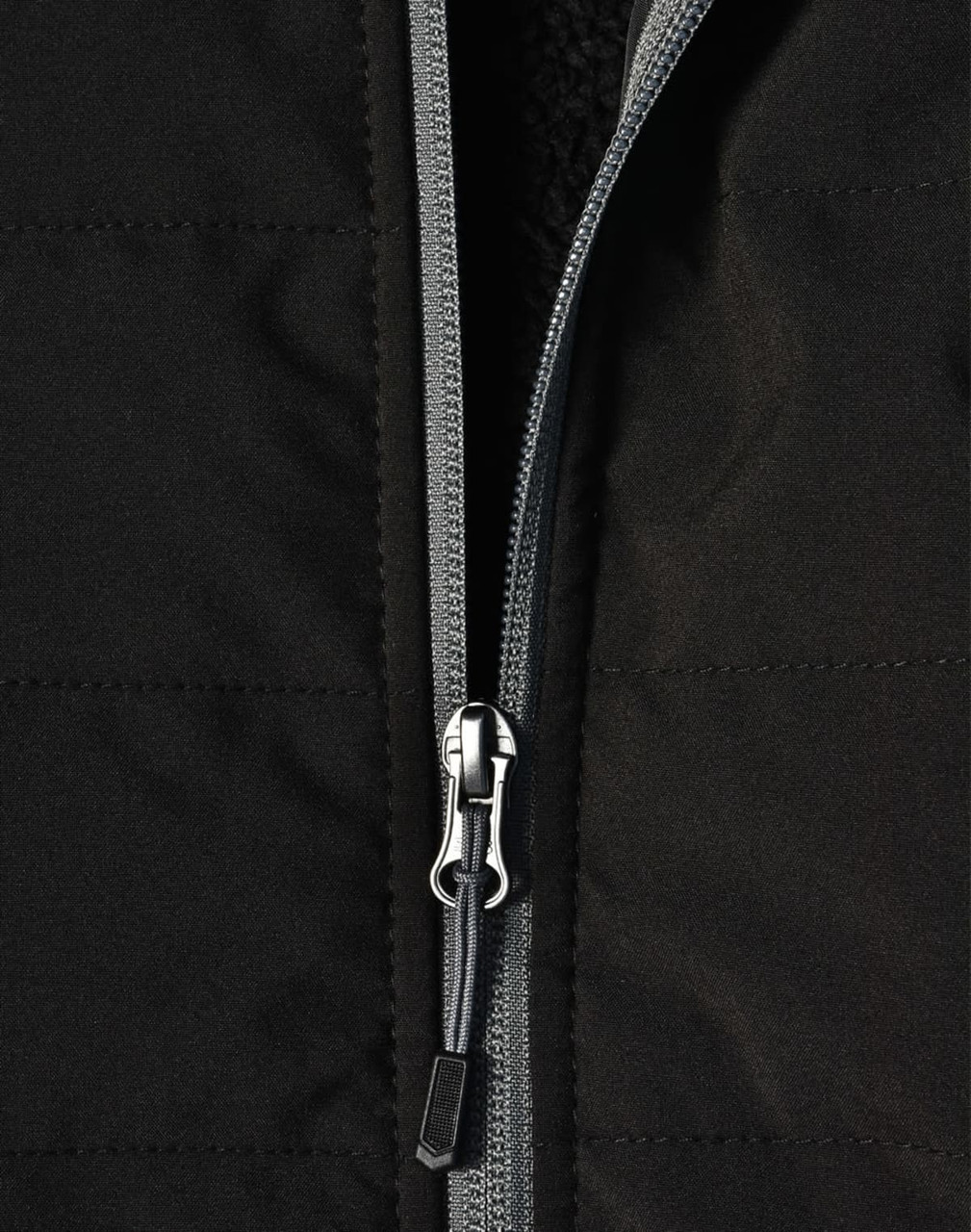 A black quilted body jacket featuring a zippered front and a heather sleeve design, with a logo present.