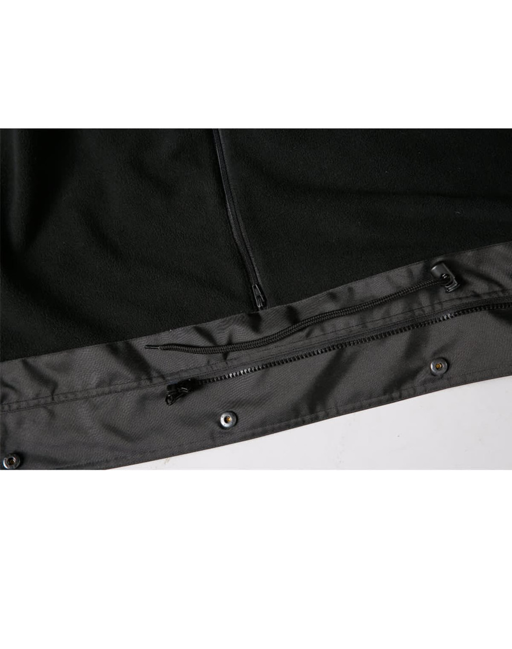 A black Long Line Stadium Jacket featuring a zippered pocket and snap fasteners at the hem. It has branding elements.